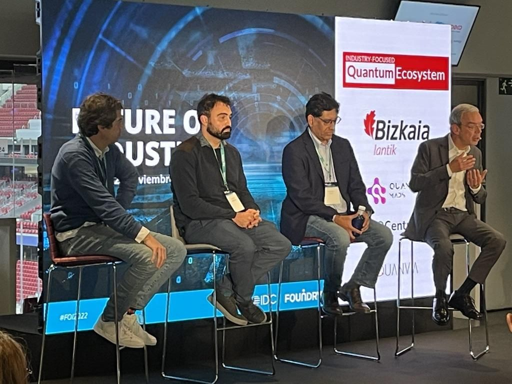 Carlos from QCentroid, on the right, with Javier González from Quantum Mads, Enrique Solano from Quanvia and Valentín García from Lantik Bizkaia at FIO2022